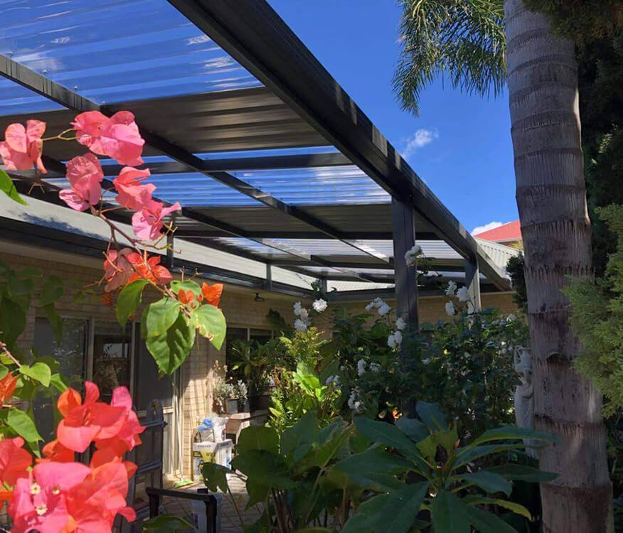 patio in perth backyard with clear and colorbond sheets to allow light in