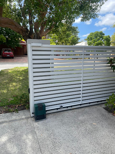 white automatic sliding gate and motor in perth home